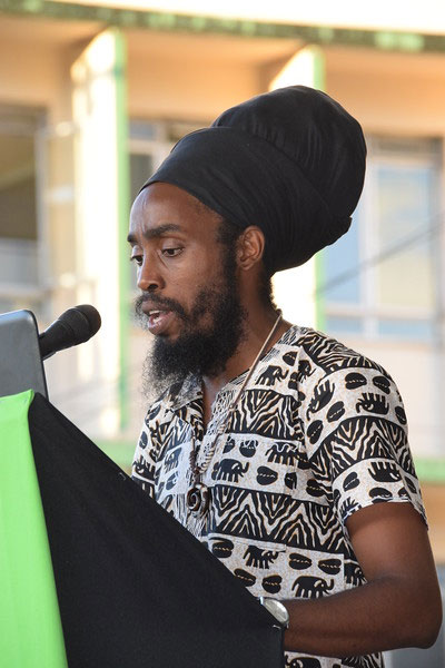 Kwesi I-Shawa Goddard, the Youth Representative of the Iyanola Council for Advancement of Rastafari (ICAR), read a special youth message in Kwéyol language from his tablet, just ahead of the reading of the Declaration of Castries.